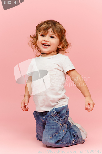 Image of Portrait of happy joyful beautiful little boy, studio shot