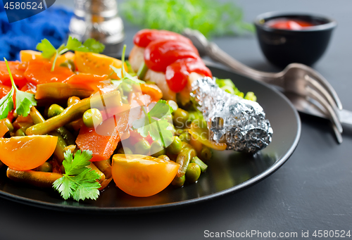 Image of vegetables with chicken leg