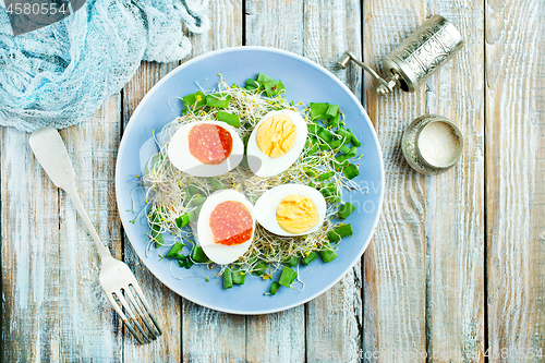 Image of eggs with red salmon caviar