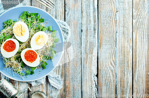 Image of eggs with red salmon caviar