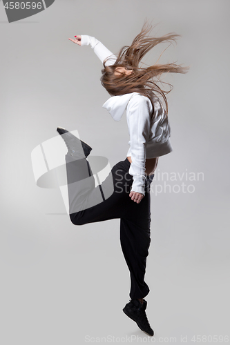 Image of attractive jumping woman