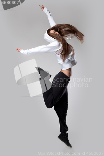 Image of attractive jumping woman