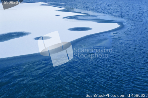Image of Frozen lake in early winter, phantom blue water color