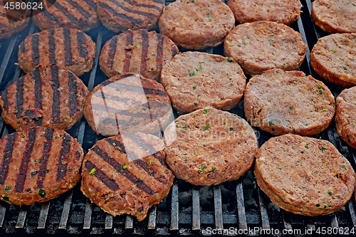 Image of Meat cutlets fried on iron bars