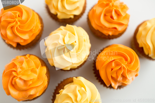 Image of cupcakes with frosting on white background