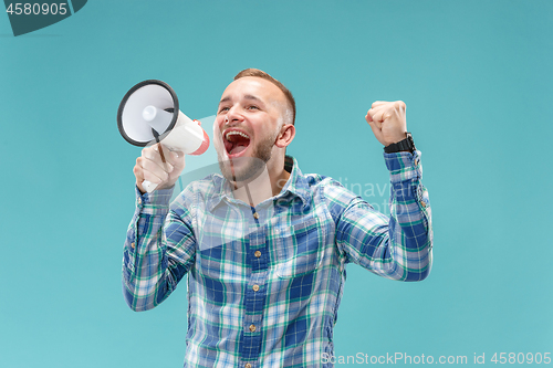 Image of man making announcement with megaphone