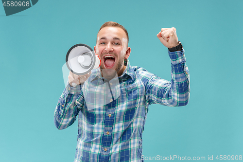 Image of man making announcement with megaphone