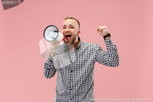 Image of man making announcement with megaphone