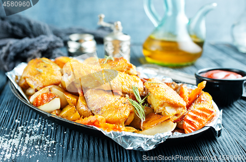 Image of potato with chicken wings