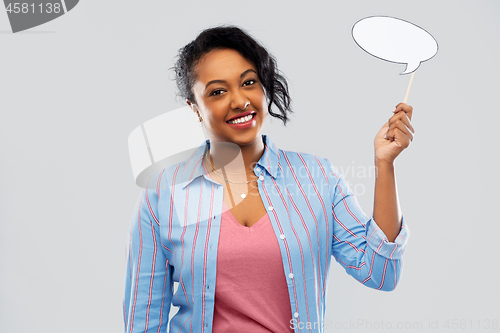 Image of happy african american woman holding speech bubble