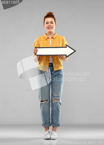 Image of redhead teenage girl with arrow showing to right