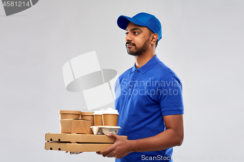 Image of indian delivery man with food and drinks