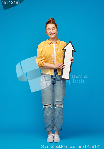 Image of red haired teenage girl with arrow showing up