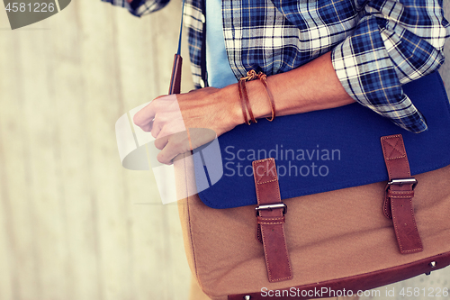 Image of close up of hipster man with stylish shoulder bag