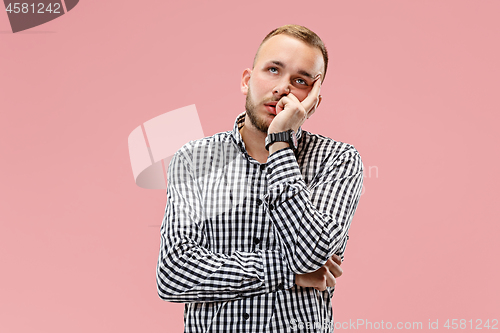 Image of Beautiful bored man bored isolated on pink background