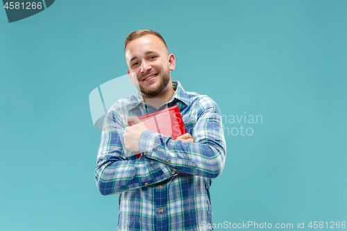 Image of Businessman hugging laptop