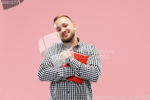 Image of Businessman hugging laptop