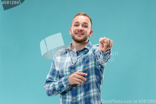 Image of The happy business man point you and want you, half length closeup portrait on pink background.