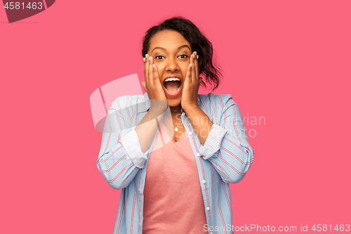 Image of happy african american woman over pink background