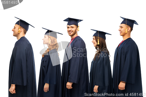 Image of graduates in mortar boards and bachelor gowns