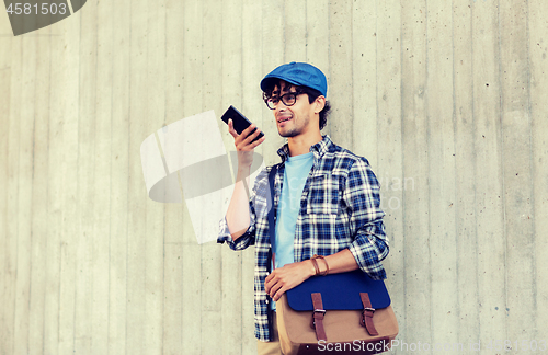 Image of man using voice command or calling on smartphone