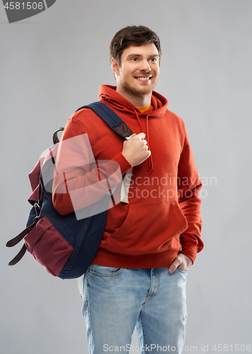 Image of young man or student with school bag or backpack