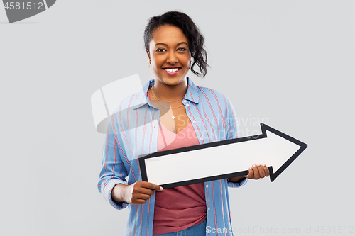 Image of african american woman with rightwards arrow