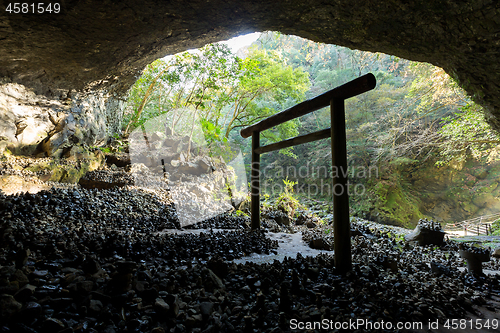 Image of Shinto shrine torii in the cave