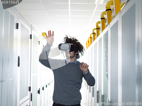 Image of IT engeneer using virtual reality headset