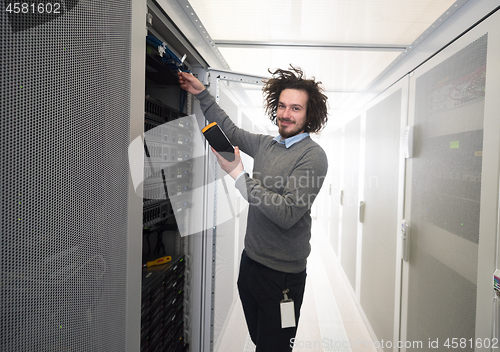 Image of technician using digital cable analyzer