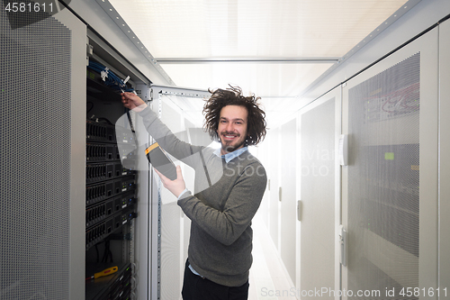 Image of technician using digital cable analyzer