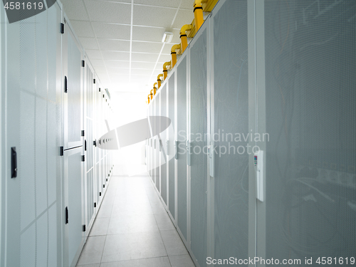 Image of modern server room with white servers