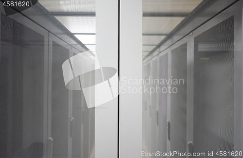 Image of modern server room with white servers