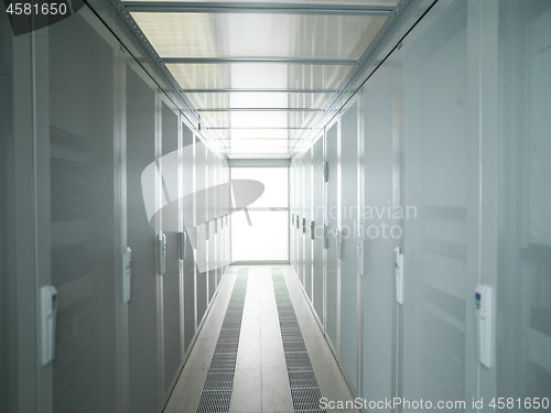 Image of modern server room with white servers