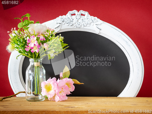 Image of Spring decoration flowers and vintage frame