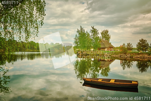 Image of Wooden Boat on the River