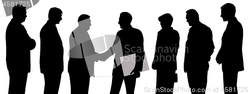 Image of Business group at a meeting shaking hands and one businessman holding folder with contract