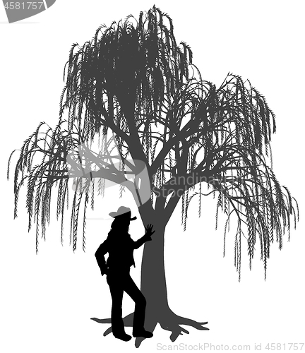Image of Young woman with hat leaning against a weeping willow tree