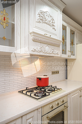 Image of Luxury modern white and beige kitchen interior