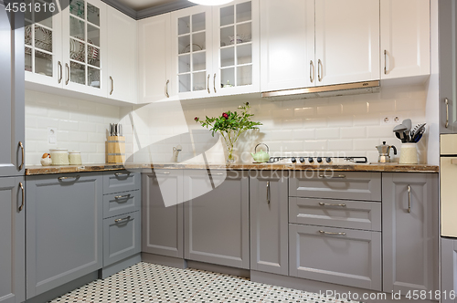 Image of modern white wooden kitchen interior