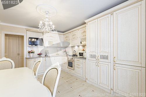 Image of Luxury modern beige and cream colored kitchen interior