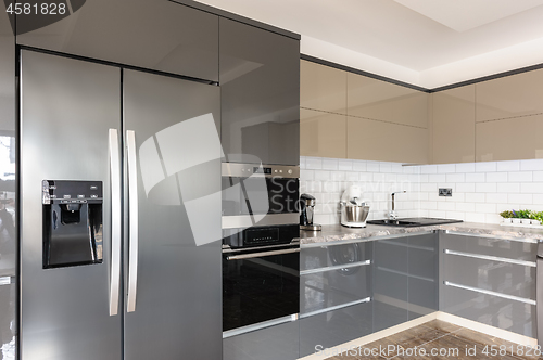 Image of Luxury modern white, beige and grey kitchen interior