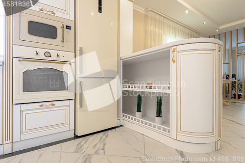 Image of neoclassic style luxury kitchen interior with island