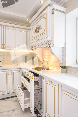 Image of neoclassic style luxury kitchen interior with island