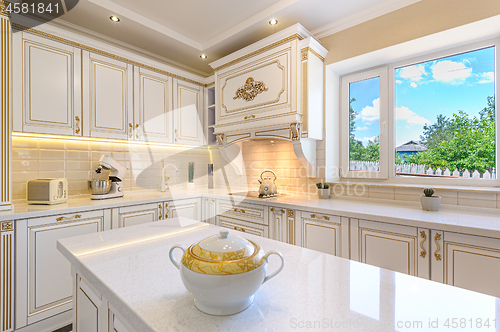 Image of neoclassic style luxury kitchen interior with island