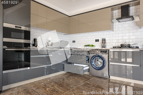 Image of Luxury modern white, beige and grey kitchen interior