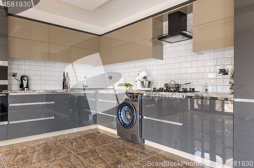 Image of Luxury modern white, beige and grey kitchen interior