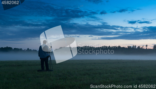Image of Photographer in a fog field
