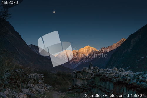 Image of Langtang valley moonrise over mountain