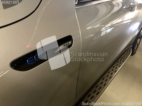 Image of A silver Mercedes-Benz EQC 1886 special edition car is parked in a parking garage in Stuttgart